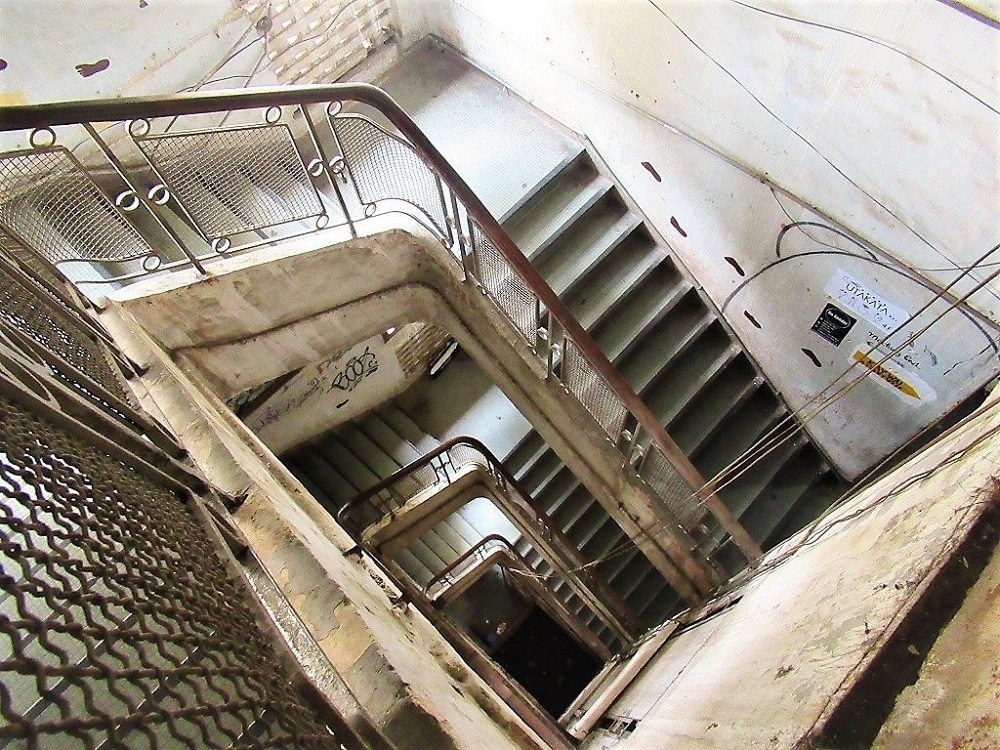 The cafe apartment's staircase gives an aesthetic vibe